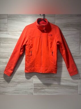 The North Face Orange Softshell Jacket 
Size Medium